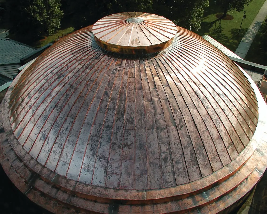 Craftsman Roofing crew installing a new roof in Putnam